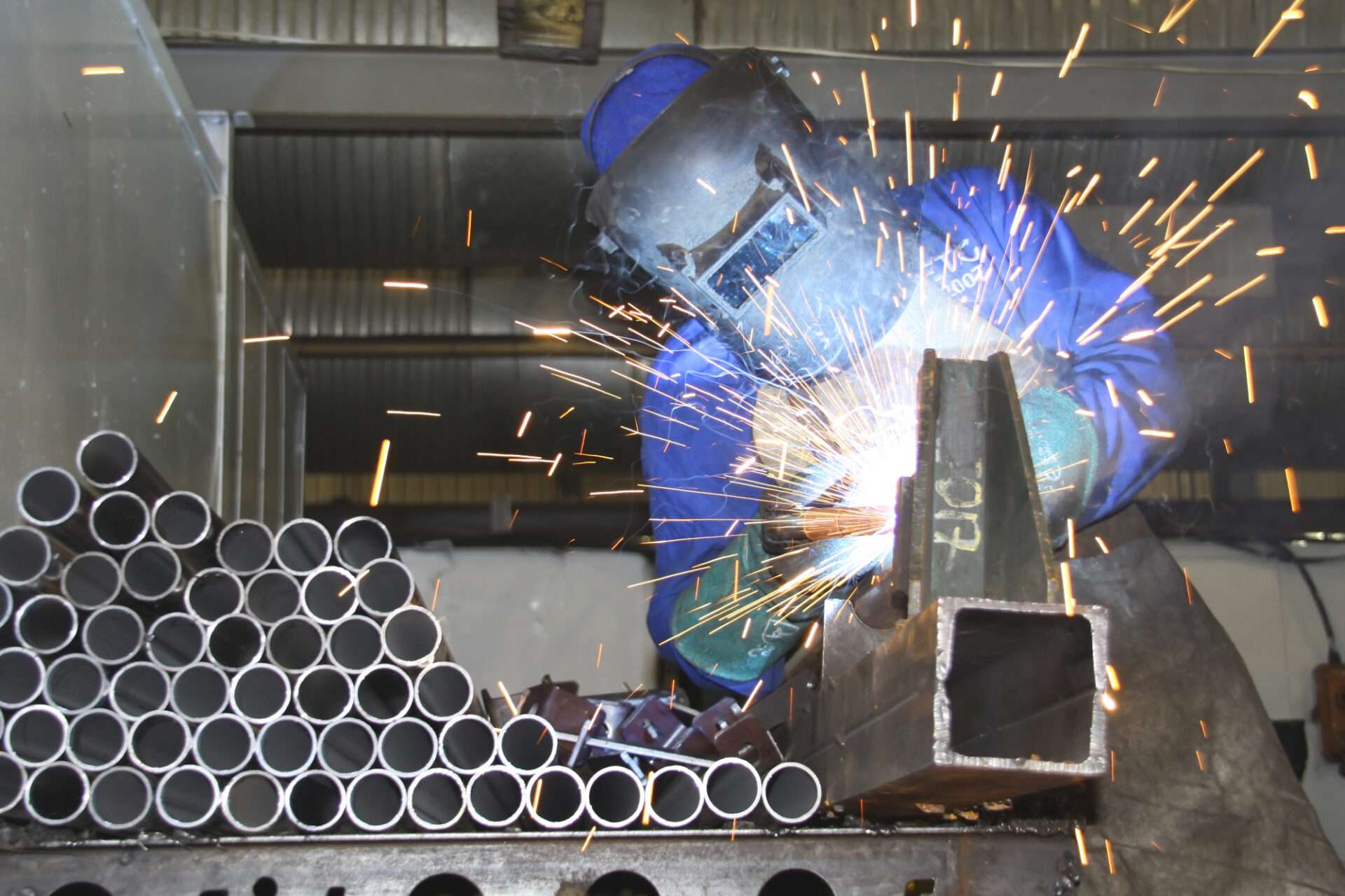 coded welder working on SHS steel section