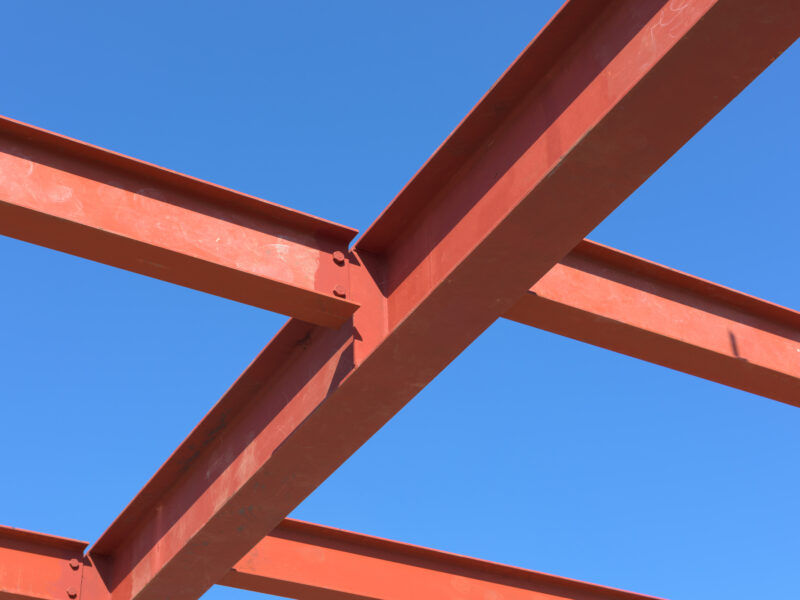 red steel beams used in construction